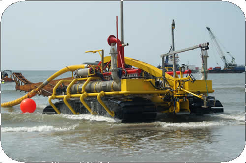 Subtrench Two Trenching Machine: Driving up the Beach. Click to go back.