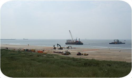 Subtrench Two Trenching Machine: Setting Up Q7 Beach Crossing with Trenching and Cable Laying Barges. Click to go back.